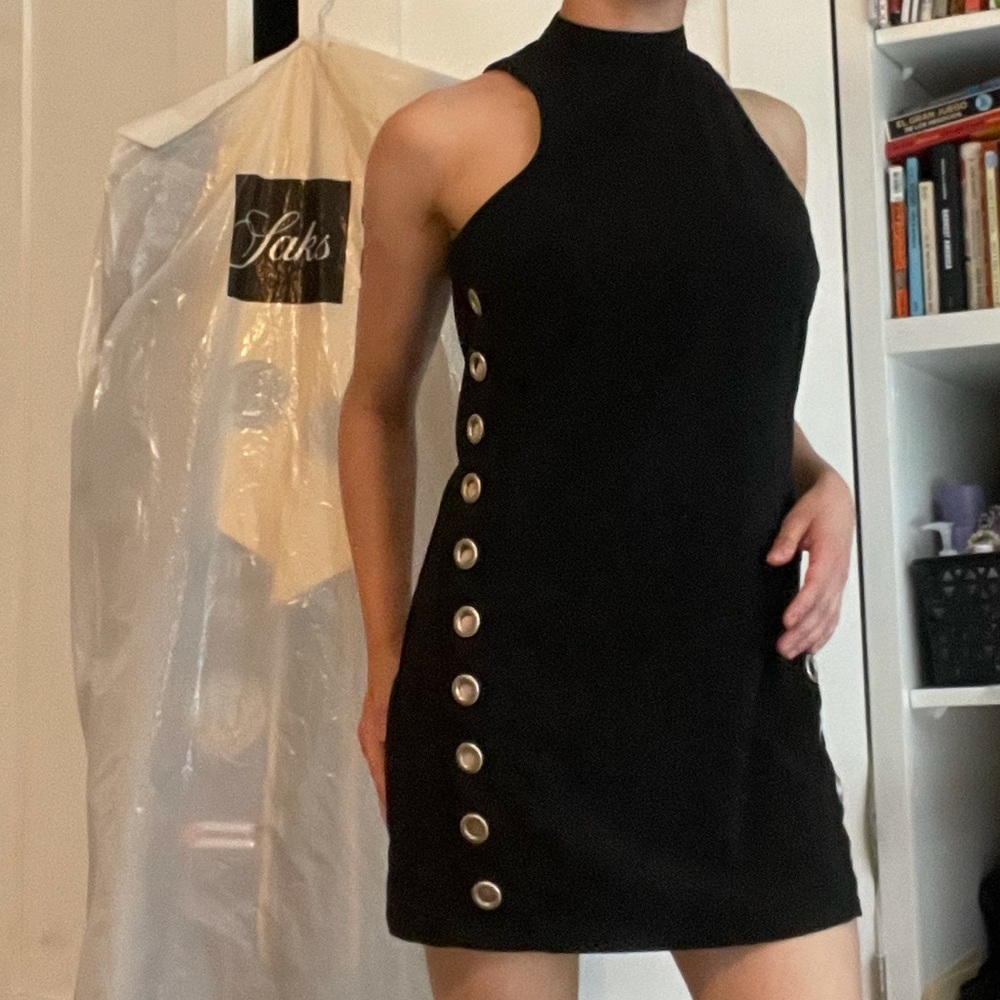 Black party cocktail dress with rivets on the side